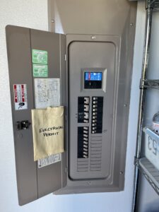 Electrical panel with safety instructions visible